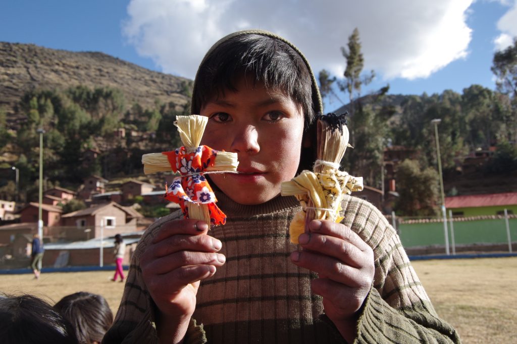One of the kids with their finished product
