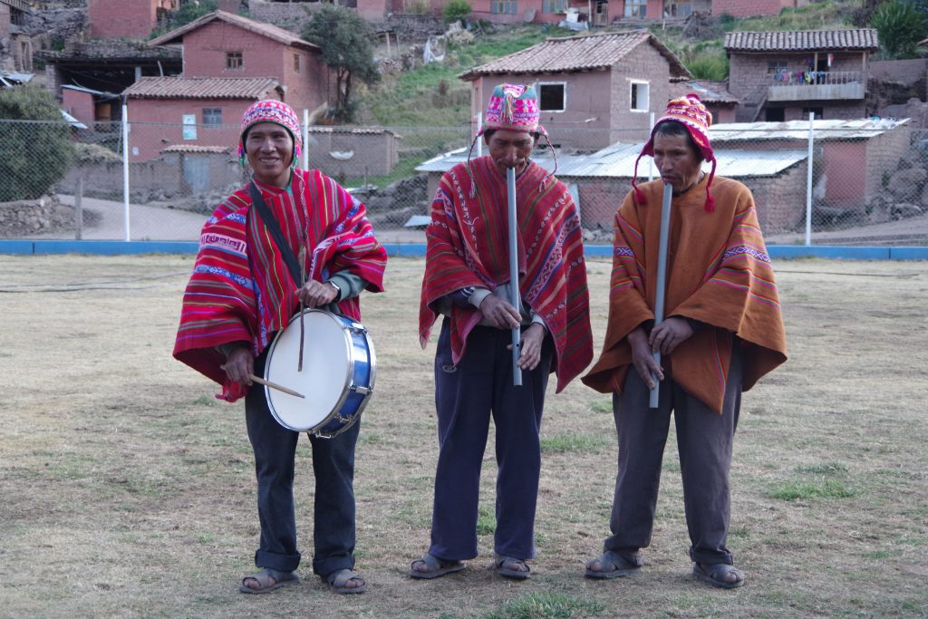 Juan, one of our cooks, plays the drum with other Qeqeños